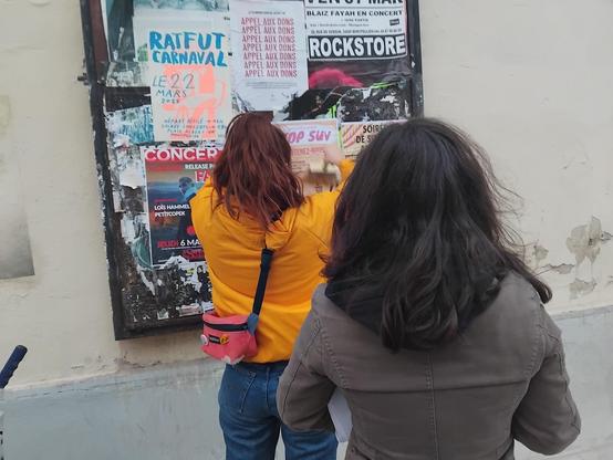 Action d'affichage pour promouvoir la table ronde du samedi 22 mars à 18h à "la base", 15 rue chaptal, Montpellier